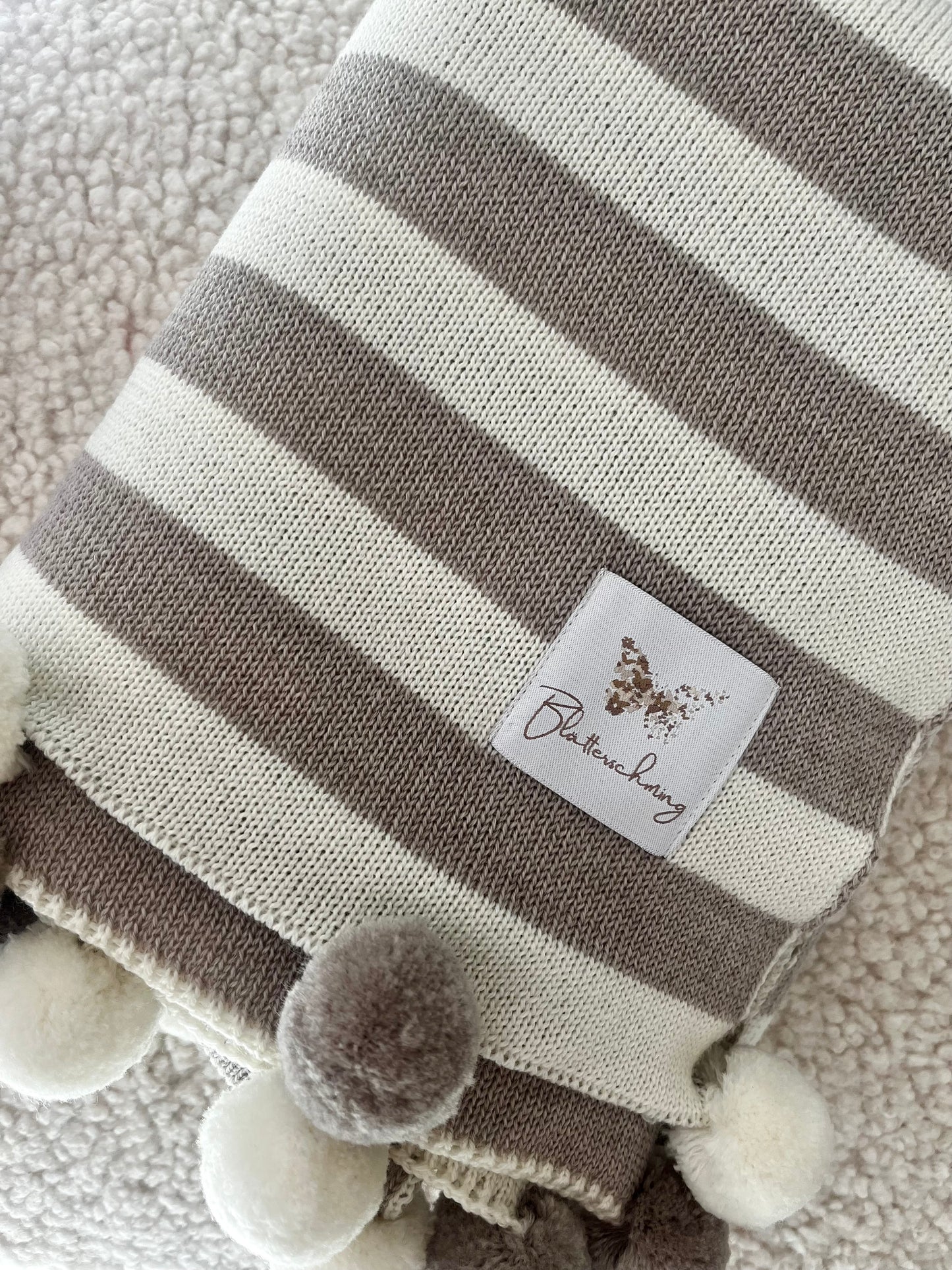 Babydecke aus Merinowolle gestreift